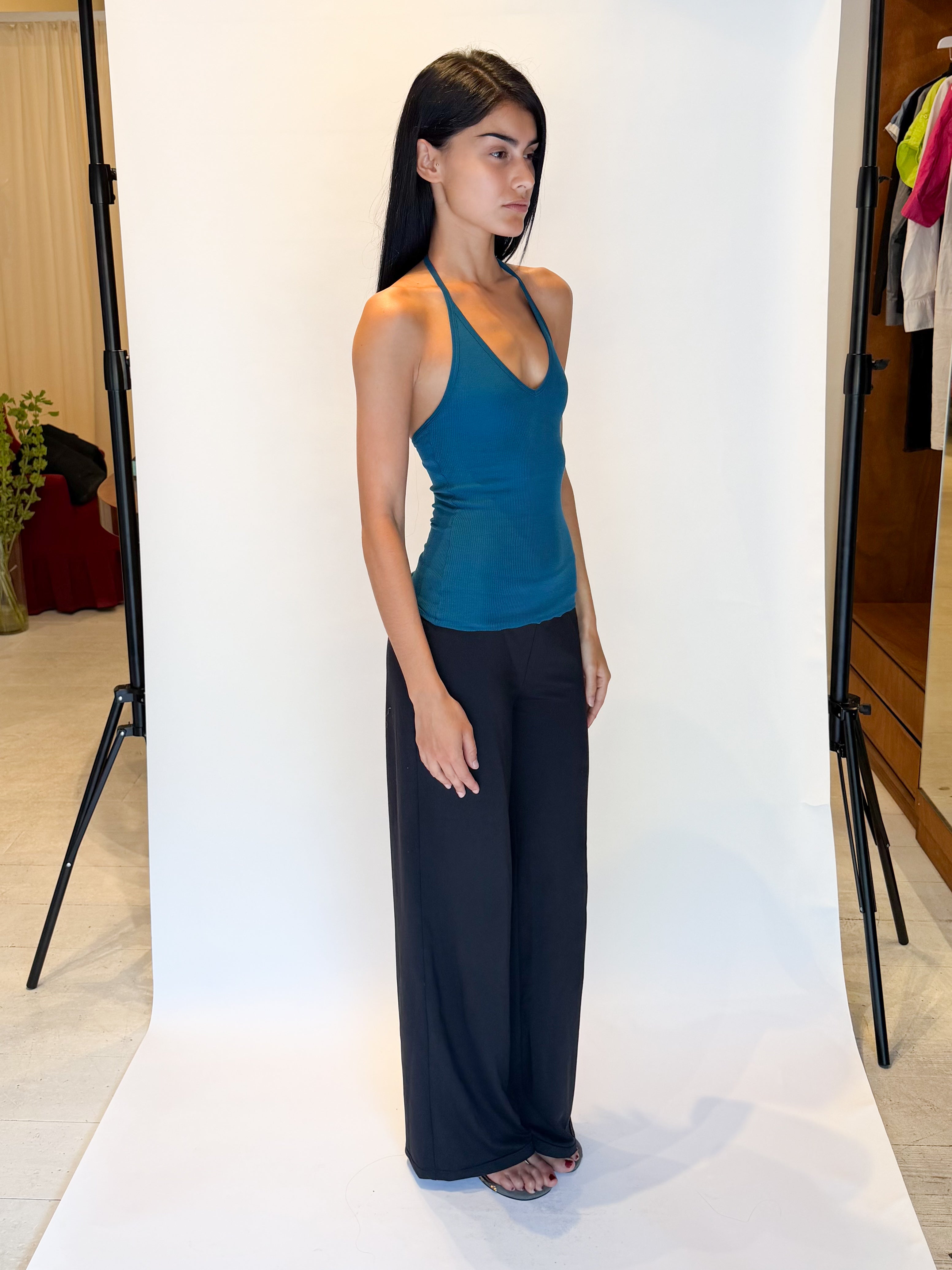 Model wearing Wilma Ribbed Halterneck Top Dark Teal