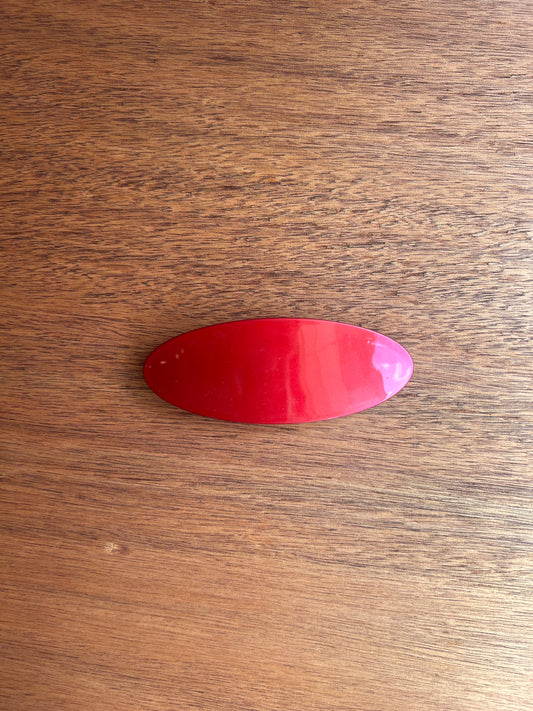 RED BARETTE